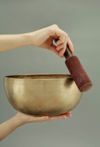 Image of hands holding a round shaped bowl